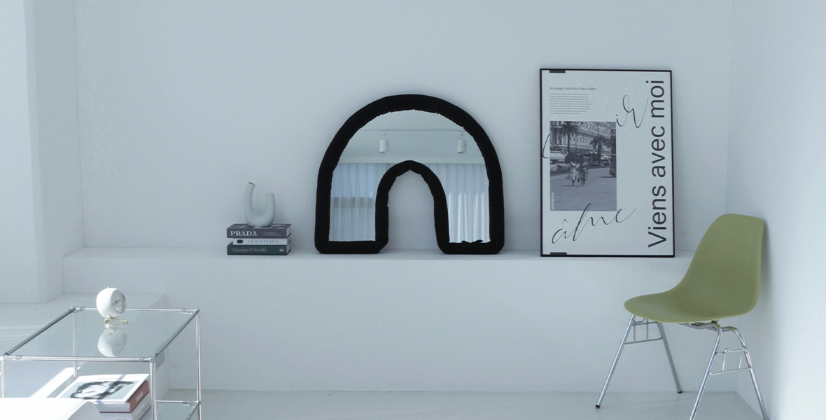  'U'Black cushion mirror	