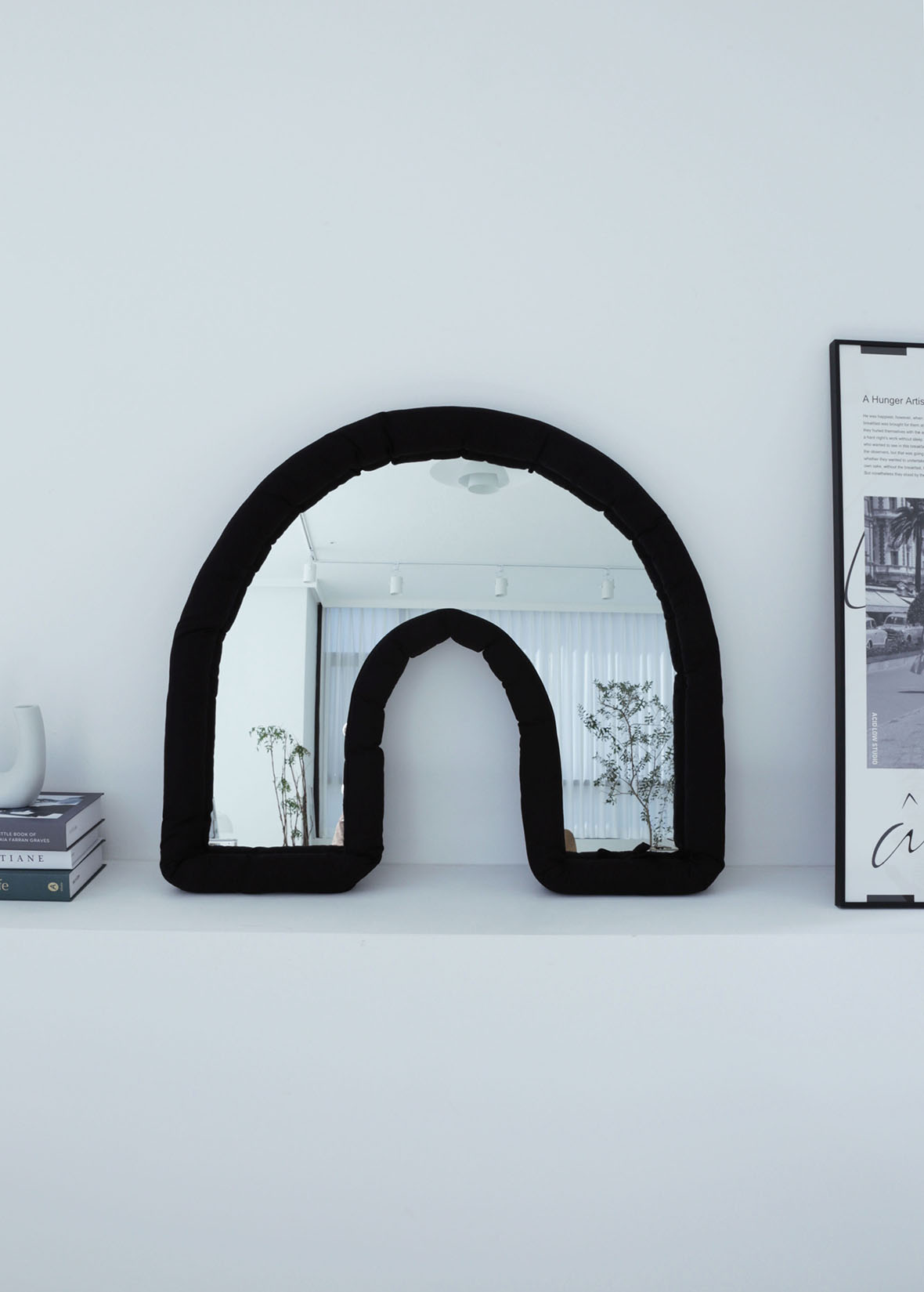 'U'Black cushion mirror	